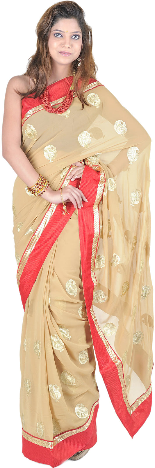 Curry-Mustard Saree with All-Over Embroidered Leaves and Red Patch Border